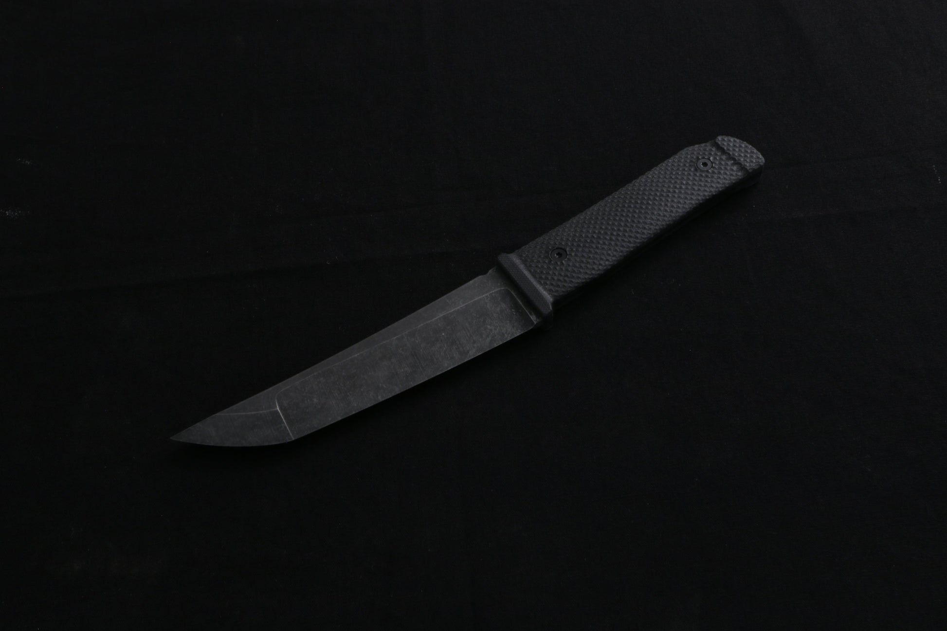 Knife on a dark surface