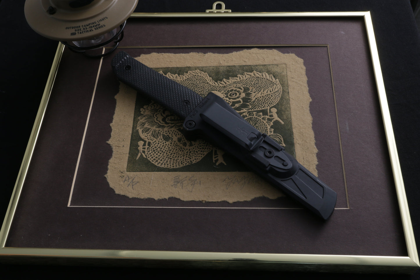 Fixed blade in sheath on Japanese photo