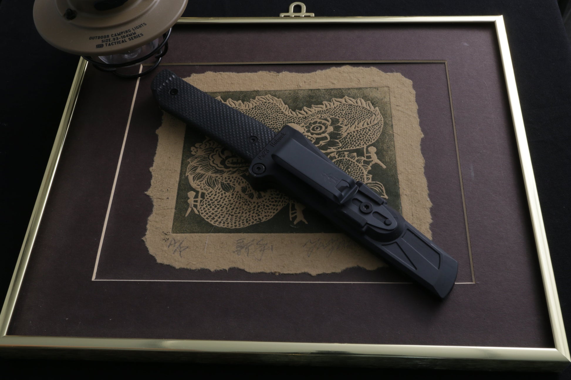 Fixed blade in sheath on Japanese photo